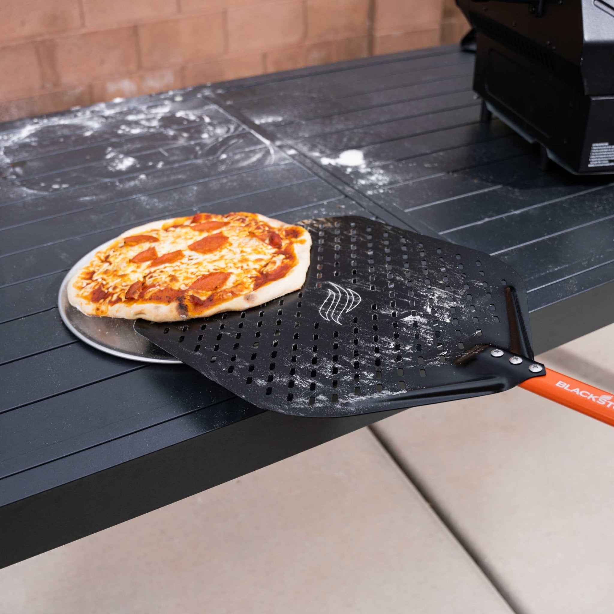 perforated-aluminum-pizza-peel-2213750.jpg